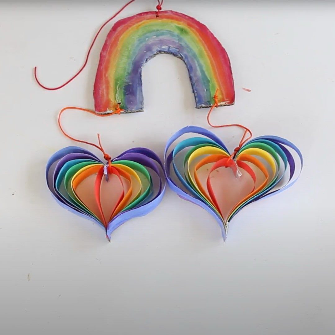 Illustration of a diy rainbow-coloured heart made of paper