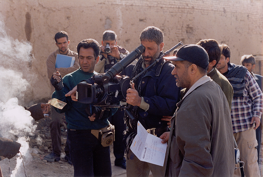 director filming something that makes smoke