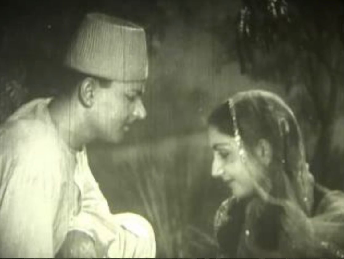 a boy and a girl talking