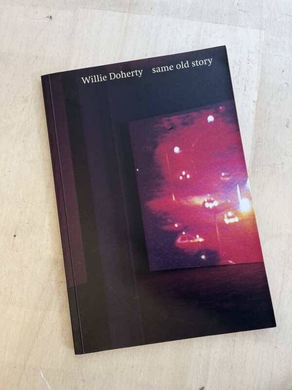 The cover of a book with text at the top indicating the author and title of the book. It reads: Willie Doherty 'same old story' in white writing